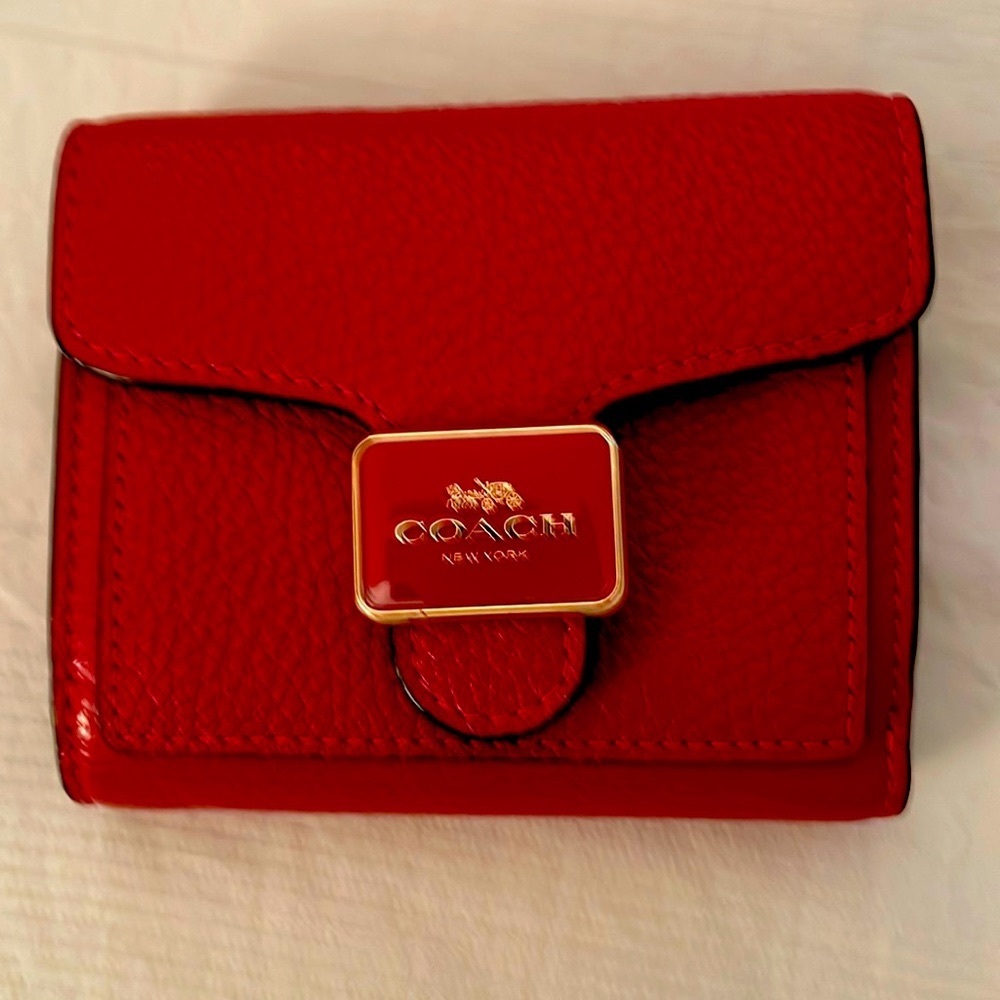 Red pebble leather Coach no-fold wallet